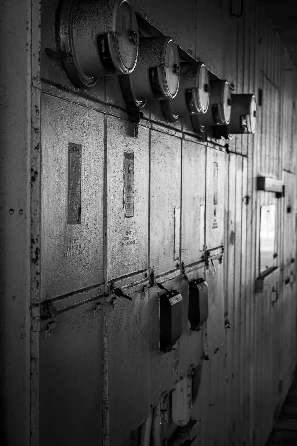 Row of electricity meters at a residential building