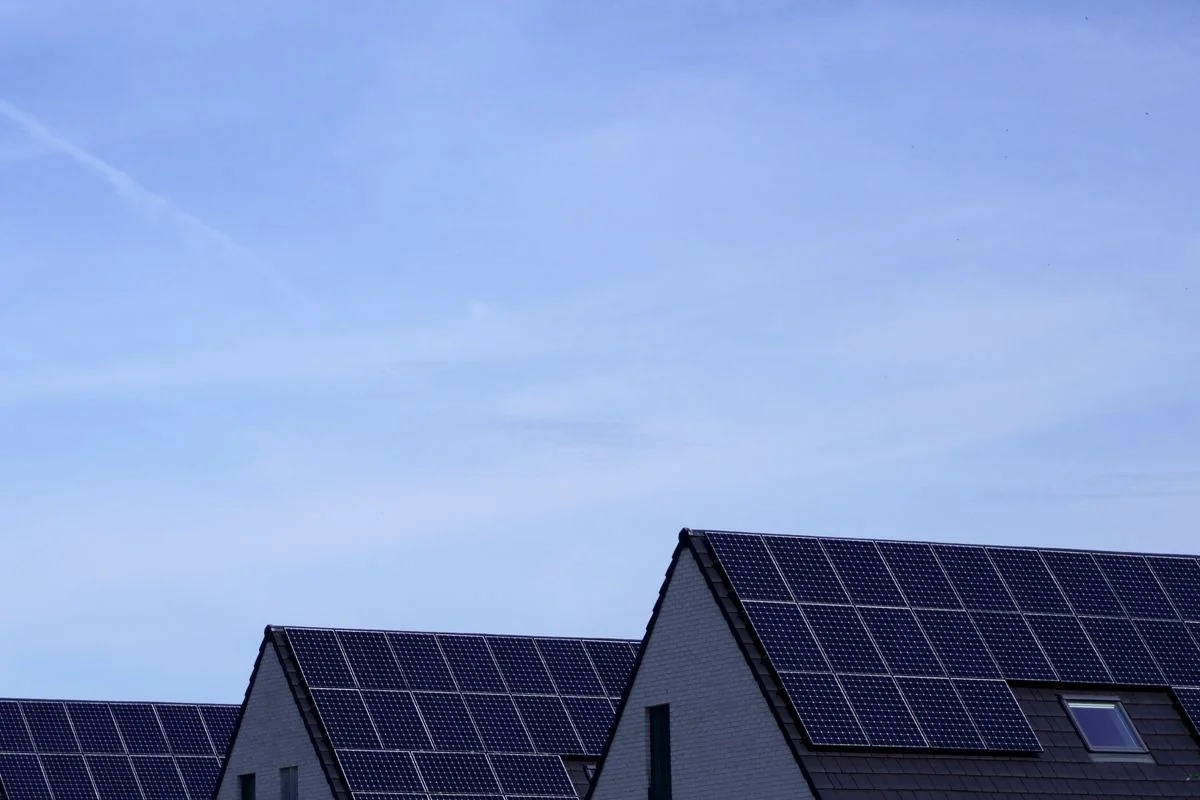 Solar panels installed on a house roof for net metering